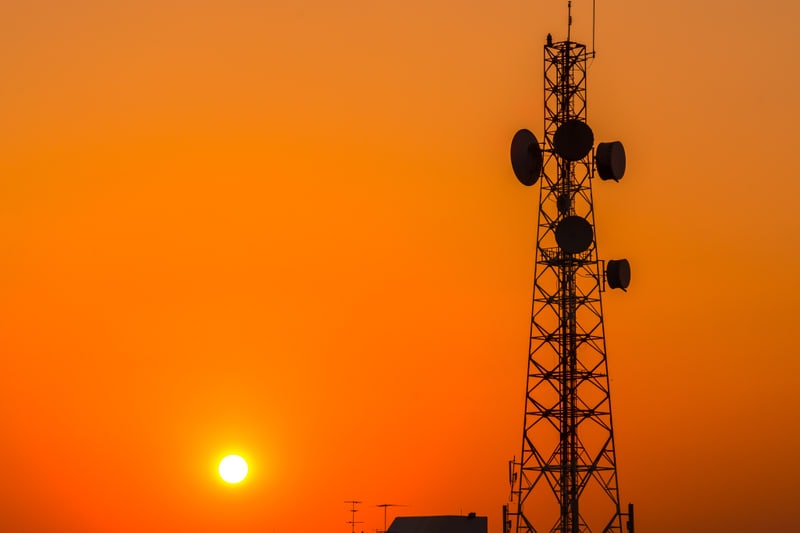 Telecommunications mast against the sky